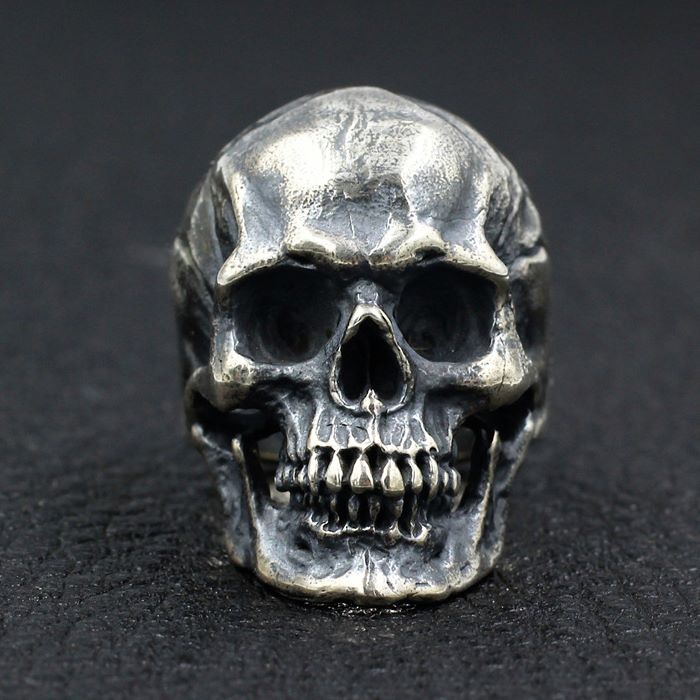 Important silver skull ring (min. 800) with articulated … | Drouot.com