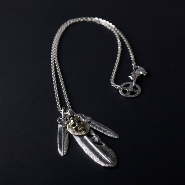 Sterling Silver Feather & Gold Skull Necklace