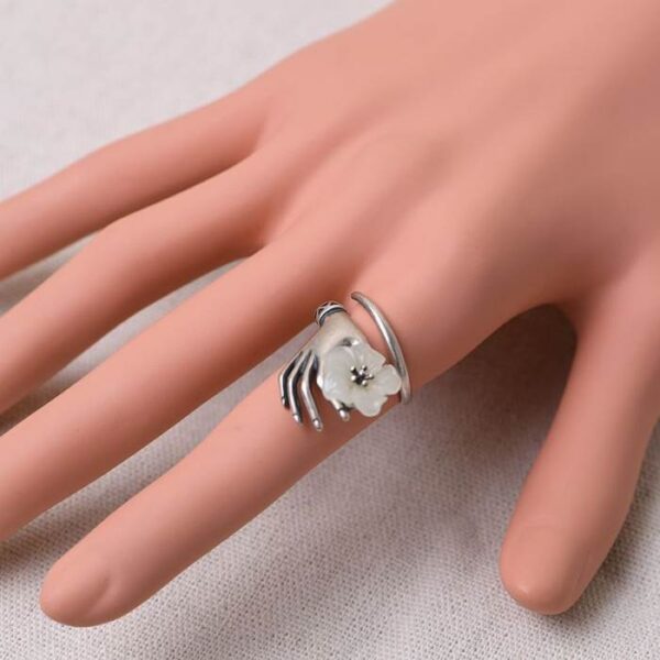 Sterling Silver Holding Flower In Hand Ring