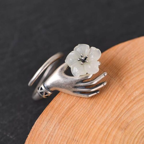 Sterling Silver Holding Flower In Hand Ring