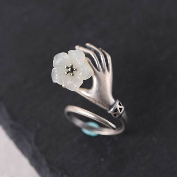 Sterling Silver Holding Flower In Hand Ring