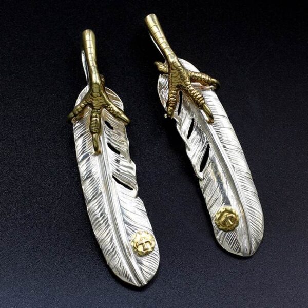 Silver Feather Pendant With Gold Claw