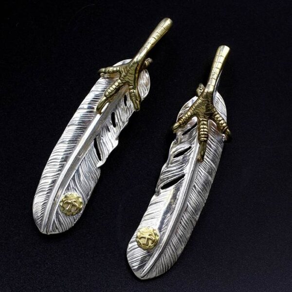 Silver Feather Pendant With Gold Claw
