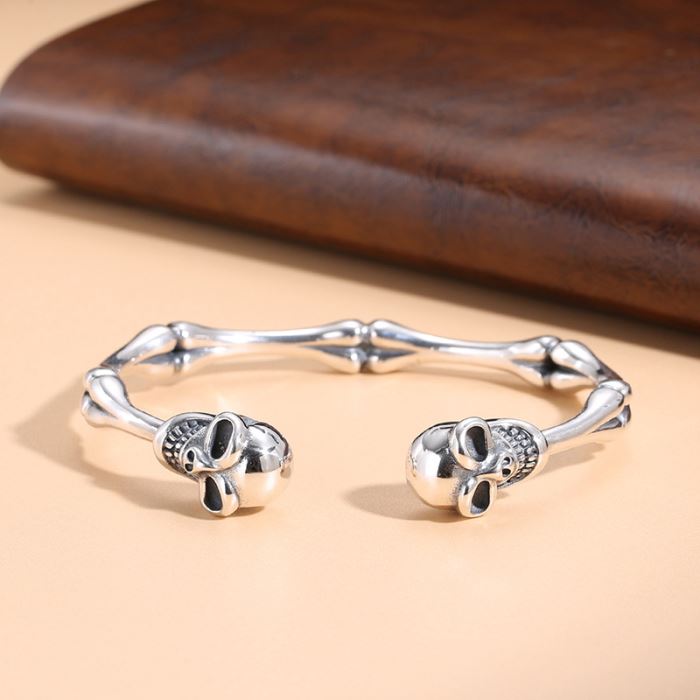 Skull and bones bracelet deals